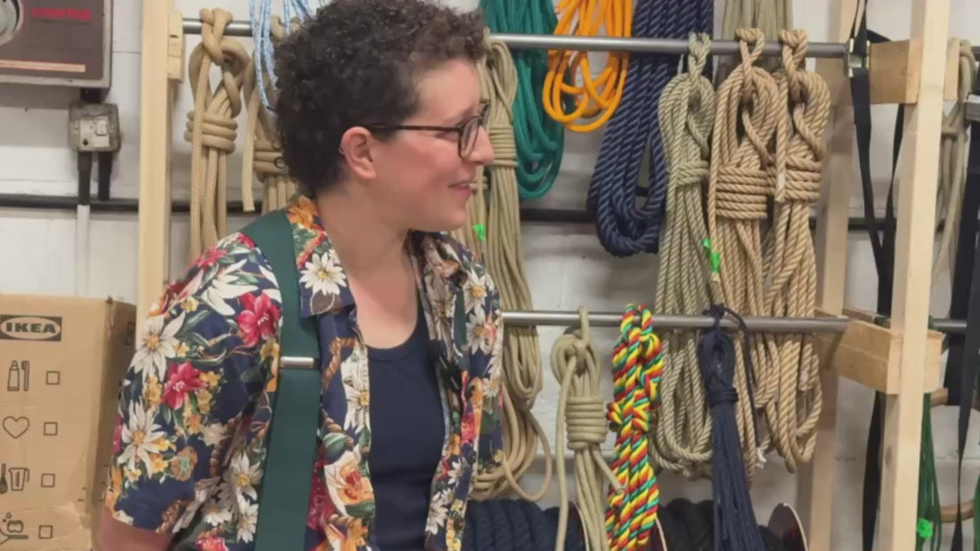 Video of yellow and red cotton threads being hand laid and hand spun into a handmade dog leash